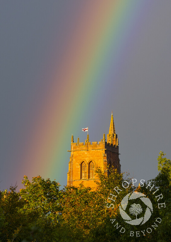A rainbow arcs over the tower of St Leonard's Church, Bridgnorth, Shropshire.